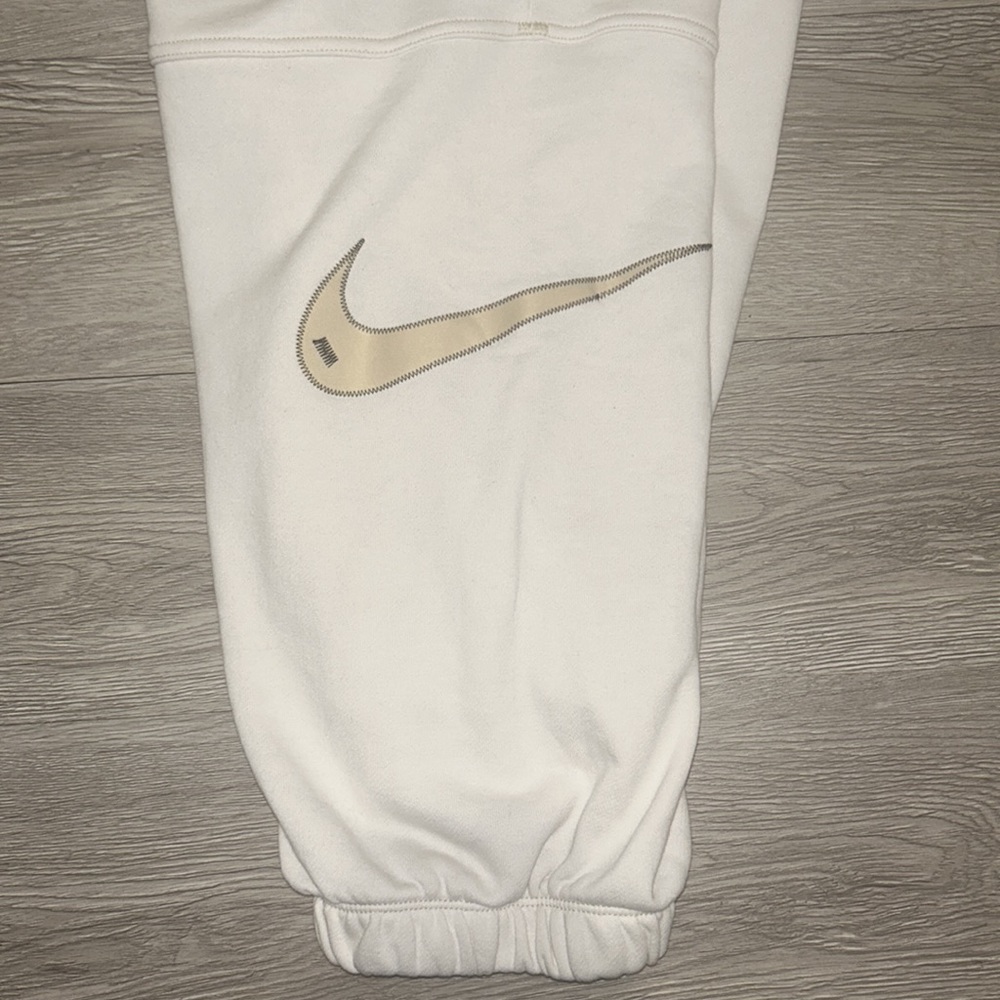 Cream oversized Nike sweatpants
